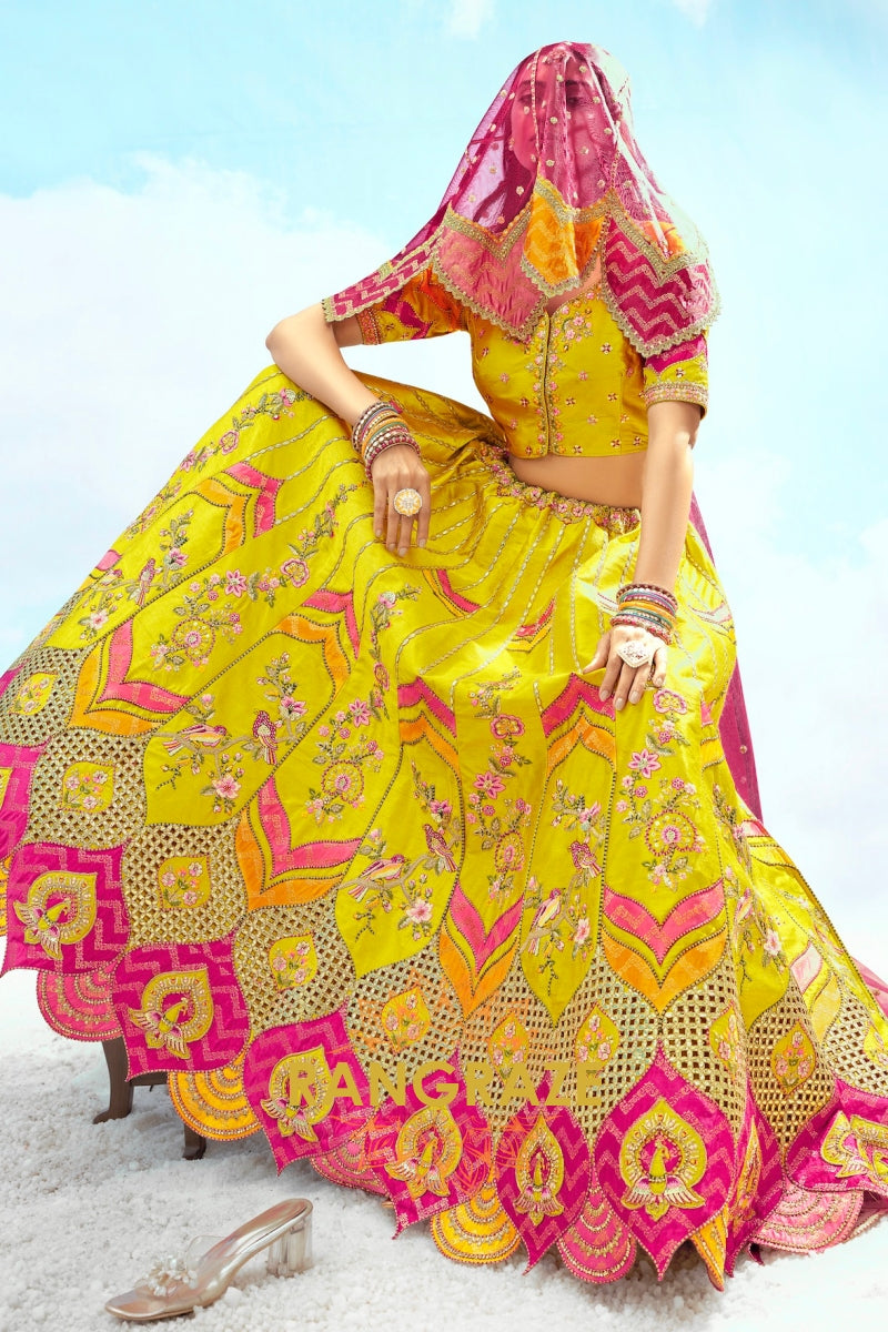 Radiant Yellow and Pink Embroidered Silk Lehenga Set