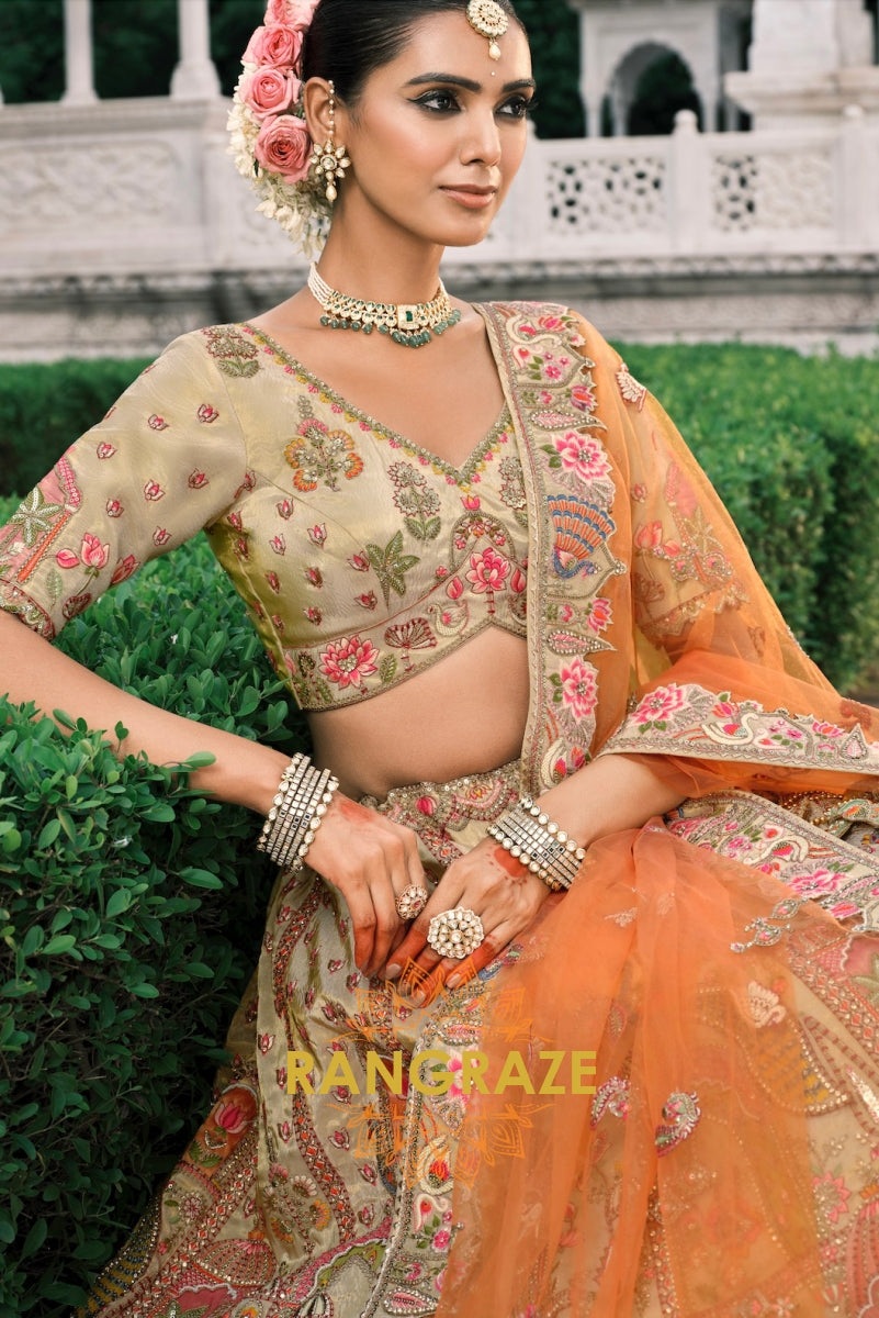 Golden Aura Olive and Tangerine Embroidered Lehenga – A Celebration of Regal Grandeur