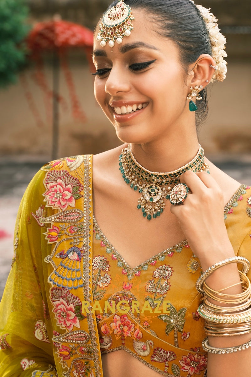 Golden Aura Mustard and Pink Heritage Lehenga – An Epitome of Regal Festivity
