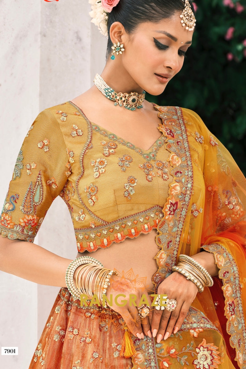 Golden Aura Mustard and Orange Embroidered Silk Lehenga – A Symphony of Heritage Artistry