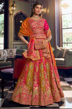 Pink And Green Banarasi Silk Lehenga WIth Hand Purse