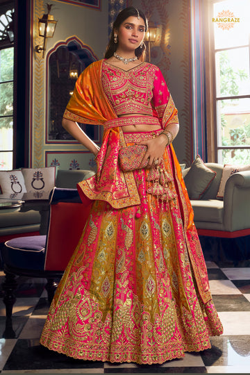 Pink And Green Banarasi Silk Lehenga WIth Hand Purse