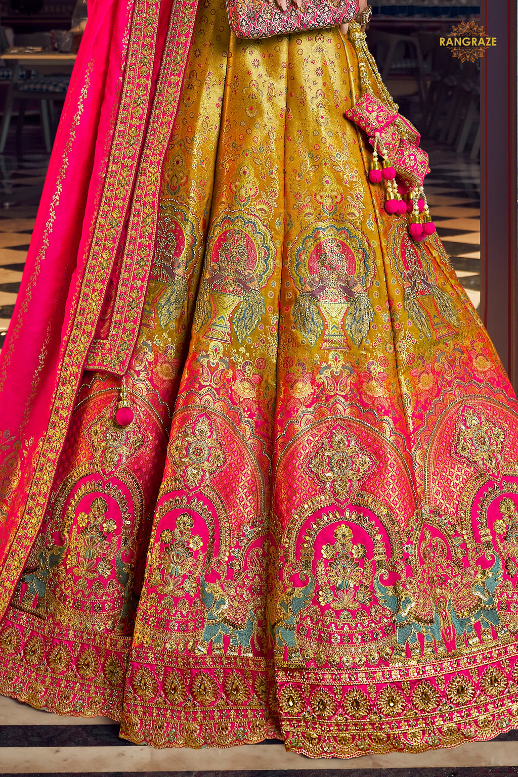 Pink And Yellow Banarasi Silk Lehenga WIth Hand Purse