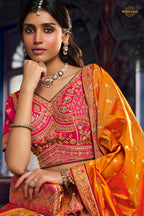 Pink And Green Banarasi Silk Lehenga WIth Hand Purse
