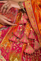 Pink And Green Banarasi Silk Lehenga WIth Hand Purse