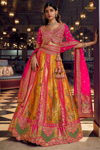 Pink And Yellow Banarasi Silk Lehenga WIth Hand Purse