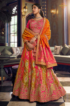 Pink And Green Banarasi Silk Lehenga WIth Hand Purse