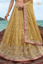 Golden Yellow Embroidered Semi-Stitched Tissue Lehenga Set