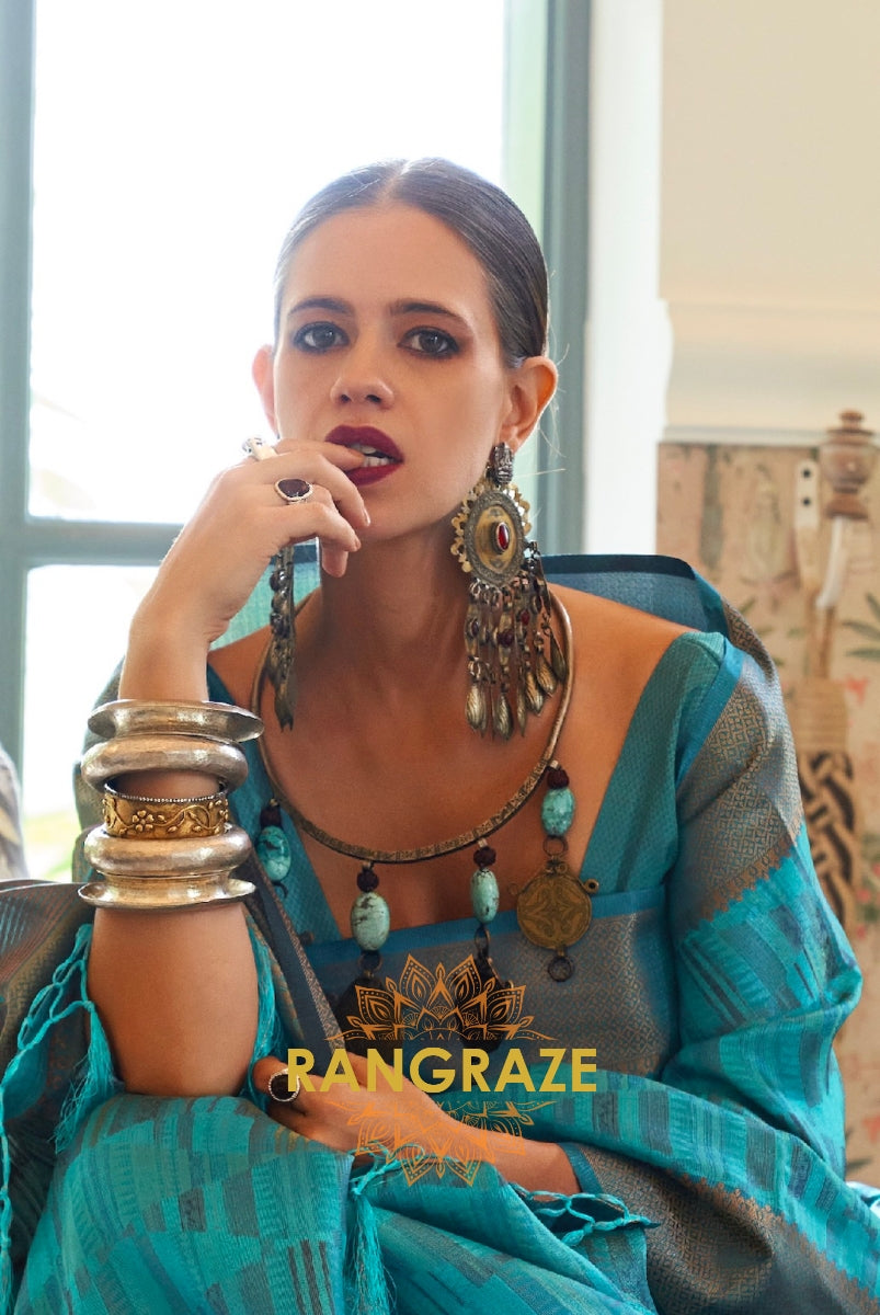 Heavy Turquoise Blue Woven Dual Tone Organza Silk Saree