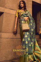 Turquoise Blue And Golden Woven Banarasi Organza Silk Saree