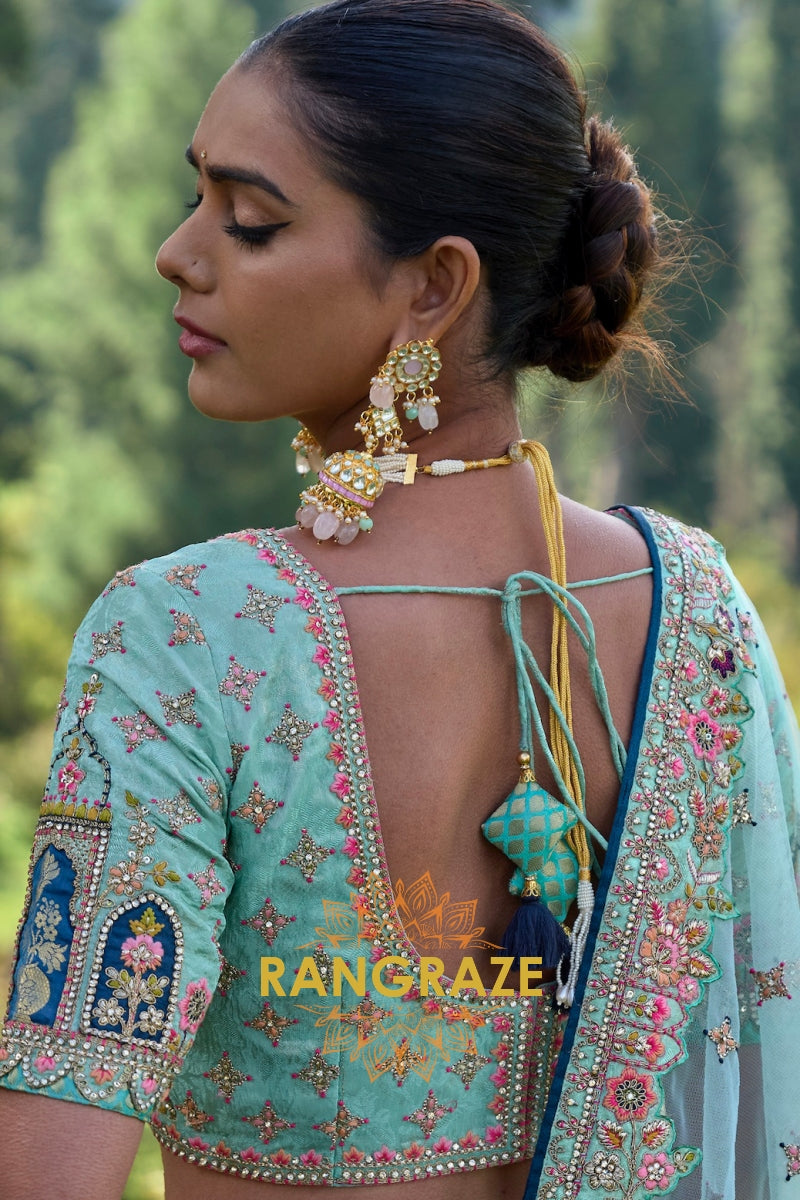 Aqua Blue Designer Lehenga – A Fusion of Artistic Opulence