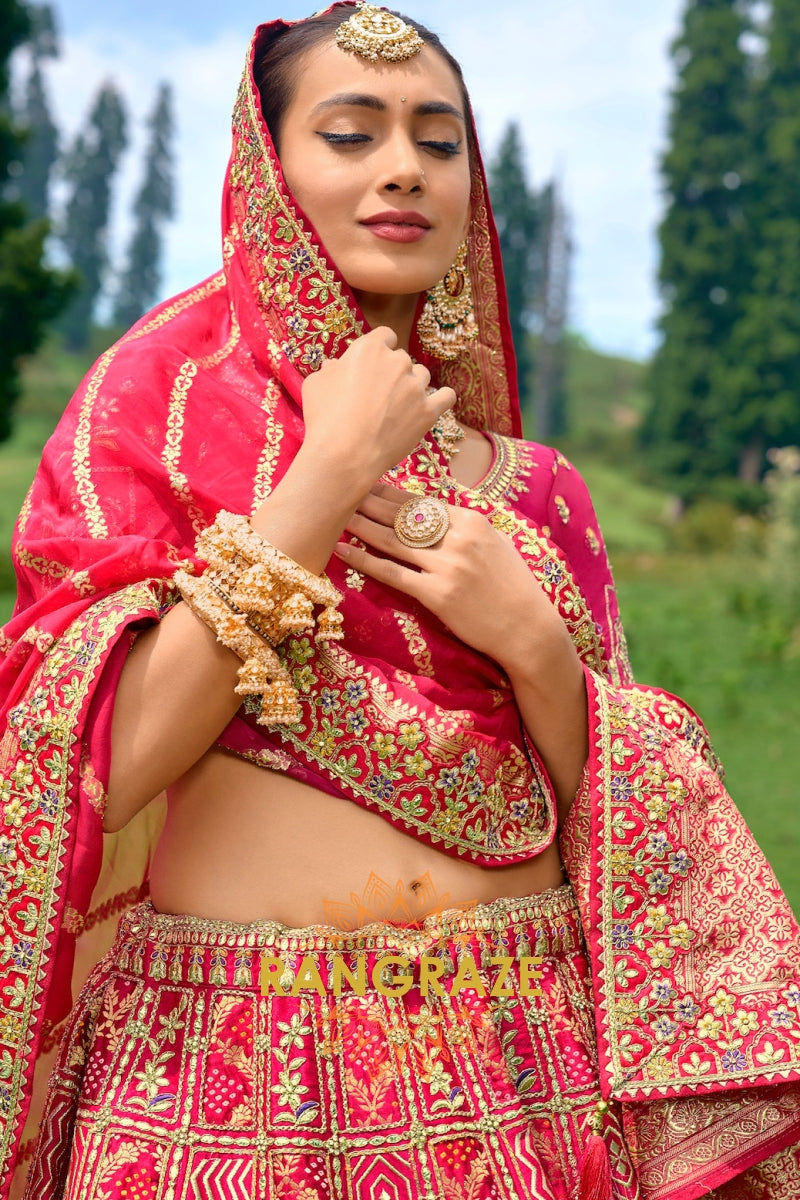 Opulent Pink and Gold Pure Bandhej Designer Bridal Lehenga – A Royal Reverie