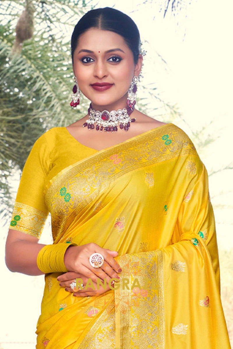 Glamorous Yellow Banarasi Silk Saree With Woven Zari Work