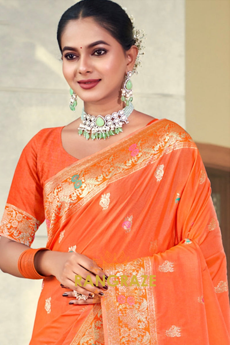 Glamorous Orange Banarasi Silk Saree With Woven Zari Work