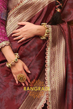 Crimson Wine Banarasi Silk Saree with Gold Zari Highlights and Designer Blouse