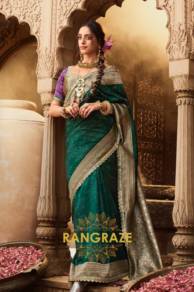 Emerald Green Banarasi Silk Saree with Antique Gold Zari Border and Contrasting Designer Blouse