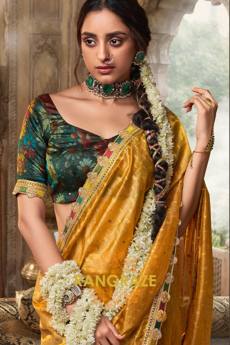 Golden Radiance Tissue Saree with Multicolored Lace and Embroidered Blouse
