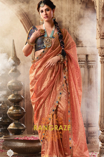 Peach Glow Tissue Saree with Intricate Lace and Designer Embroidered Blouse