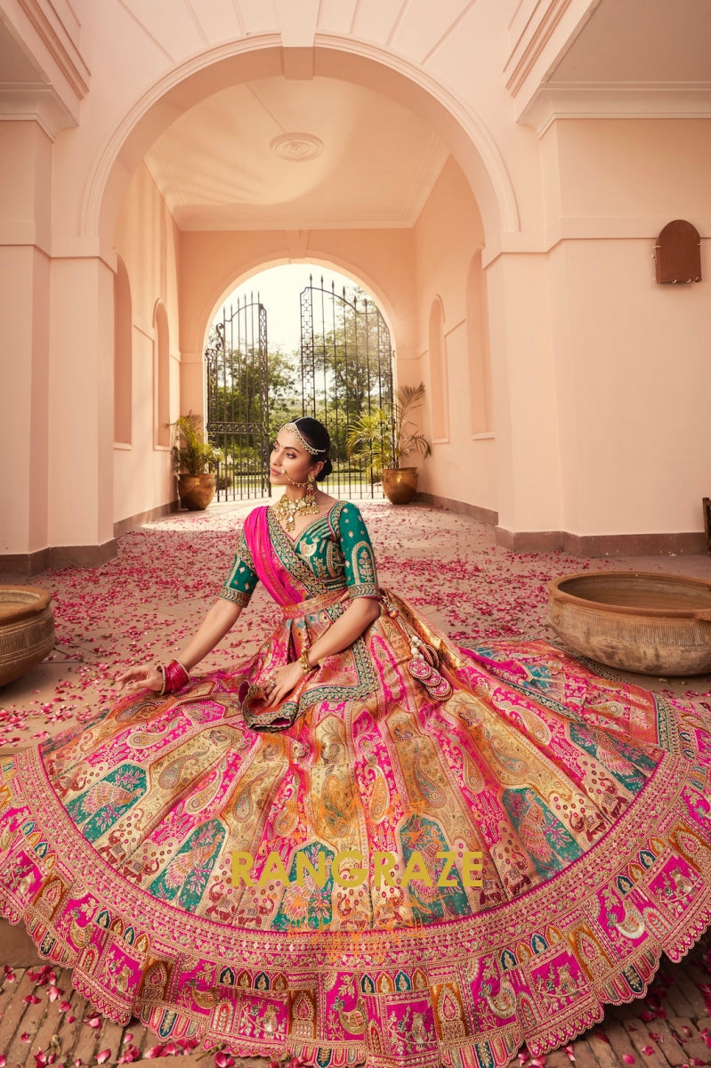 Emerald Fuchsia Banarasi Silk Lehenga with Peacock Motifs and Embroidered Clutch