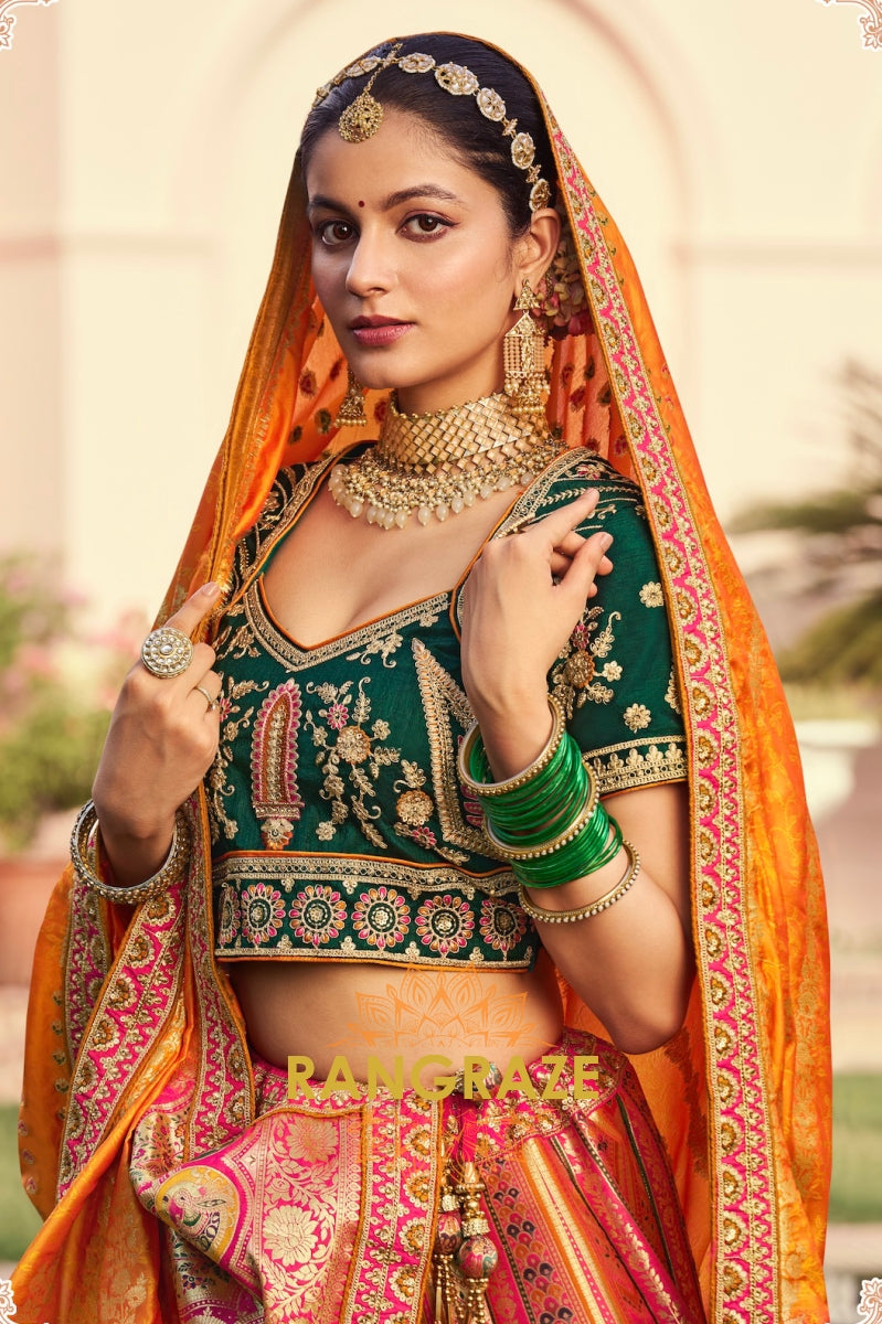 Amber Bloom Banarasi Silk Lehenga with Emerald Blouse and Ornate Orange Dupatta