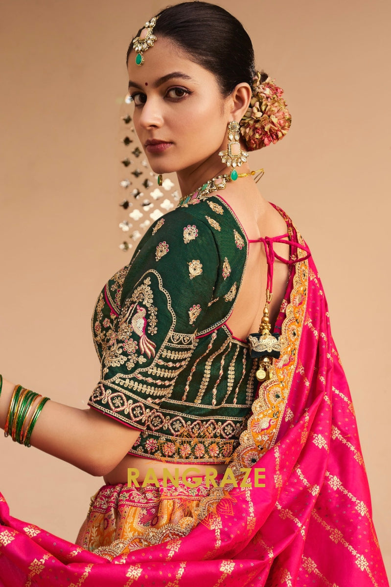 Royal Vistara Orange and Green Banarasi Lehenga with Jacquard Blouse & Potli Bag