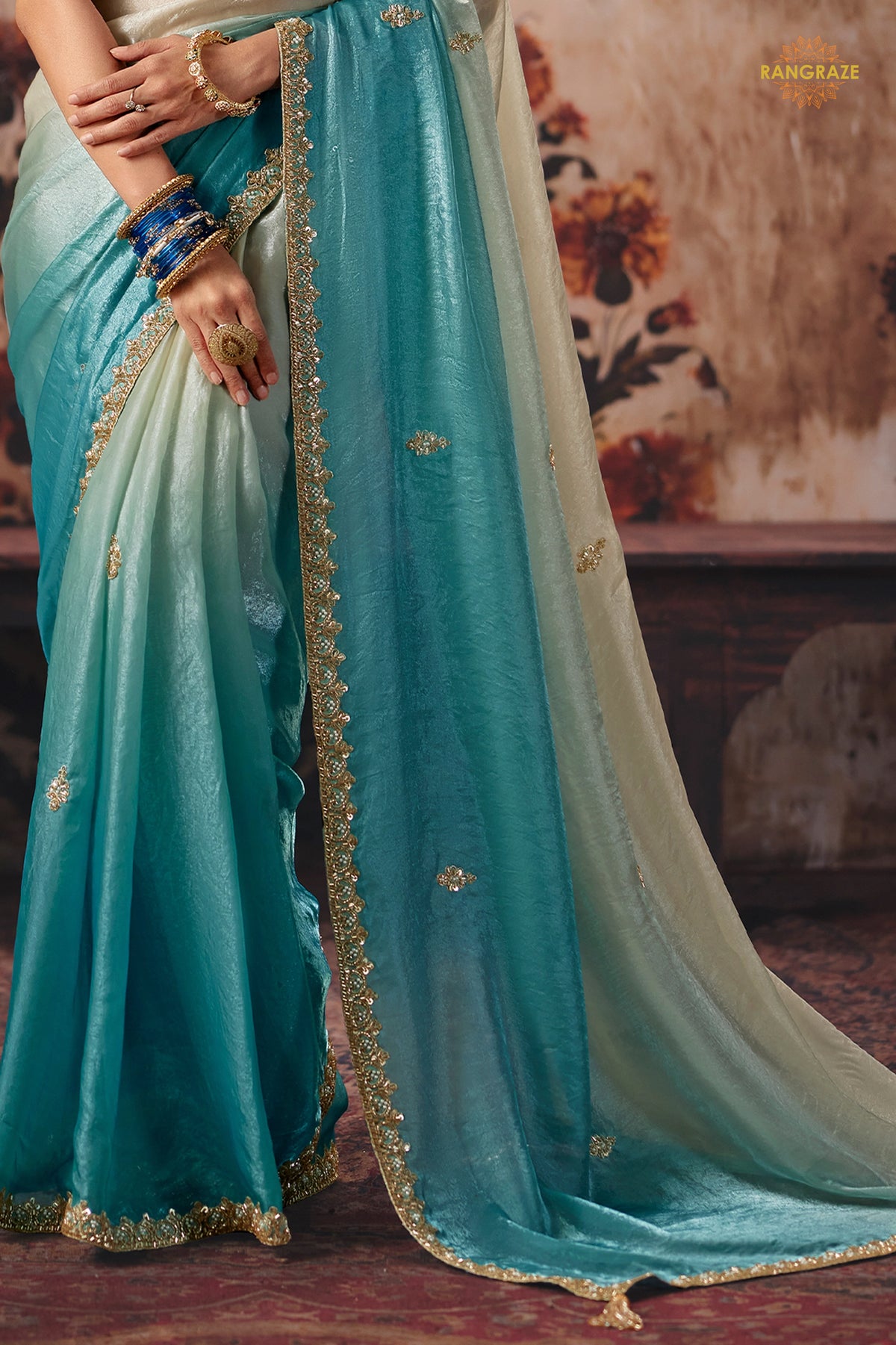 Cream And Blue Designer Satin Silk Saree With Embroidered Blouse