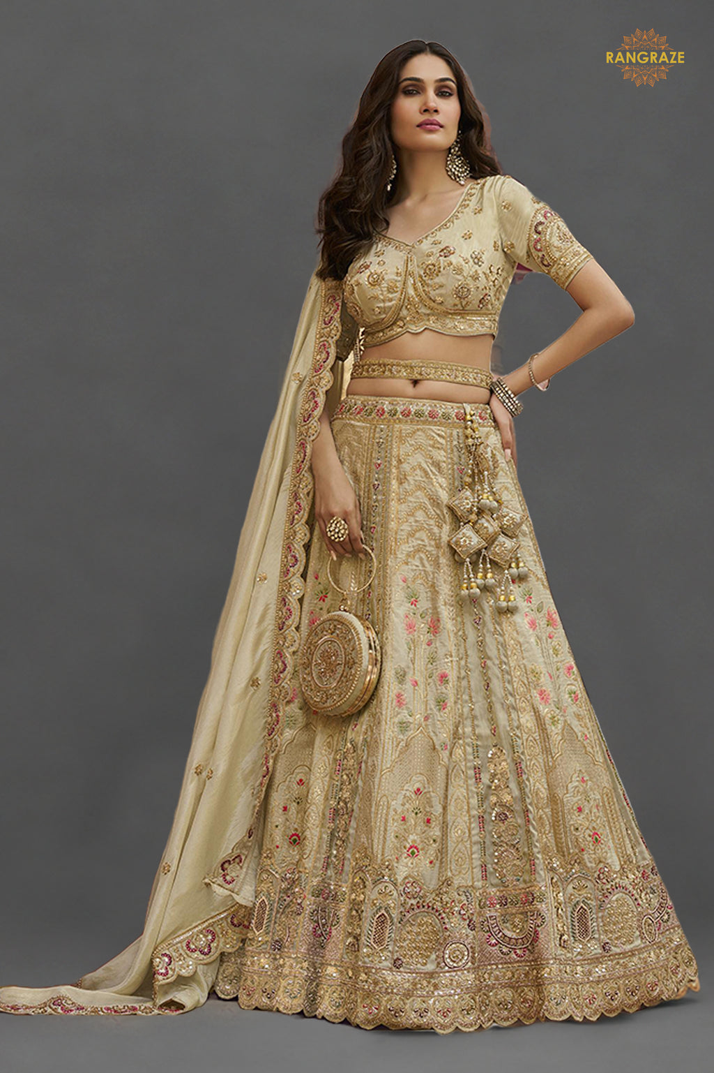 Cream Gold Heavy Work Banarasi Silk Lehenga With Clutch
