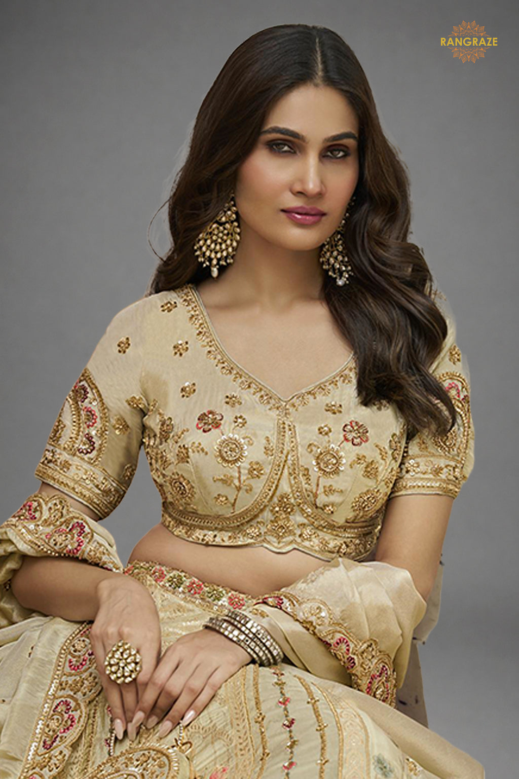 Cream Gold Heavy Work Banarasi Silk Lehenga With Clutch
