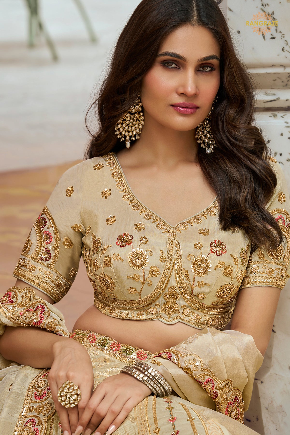 Cream Gold Heavy Work Banarasi Silk Lehenga With Clutch