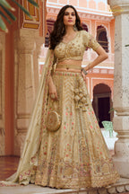 Cream Gold Heavy Work Banarasi Silk Lehenga With Clutch