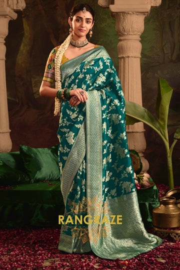 Enchanted Teal Banarasi Silk Saree with Golden Floral Grandeur