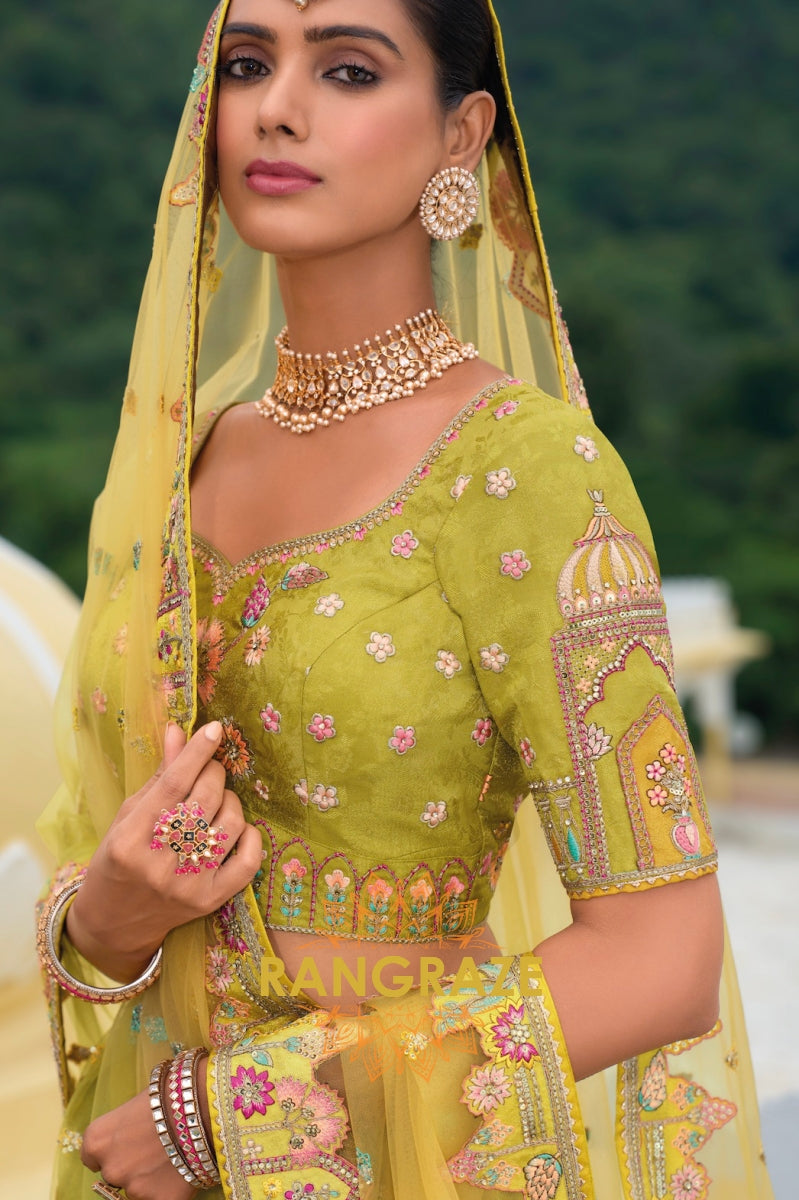 Enchanted Spring Green and Aqua Handcrafted Heritage Lehenga – A Symphony of Art and Culture