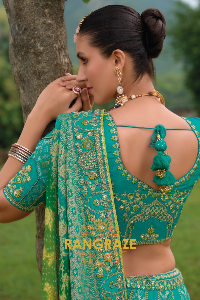 Emerald Bliss Green and Gold Handcrafted Banarasi Lehenga – A Symphony of Elegance