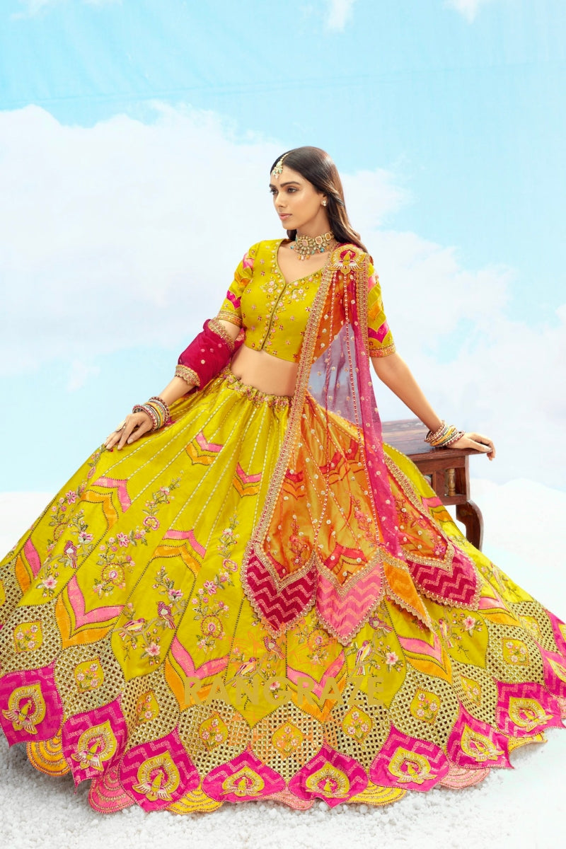 Radiant Yellow and Pink Embroidered Silk Lehenga Set