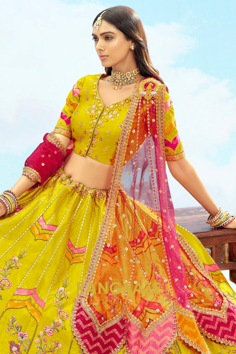 Radiant Yellow and Pink Embroidered Silk Lehenga Set
