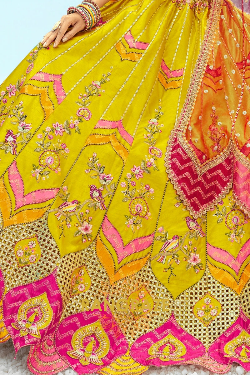 Radiant Yellow and Pink Embroidered Silk Lehenga Set
