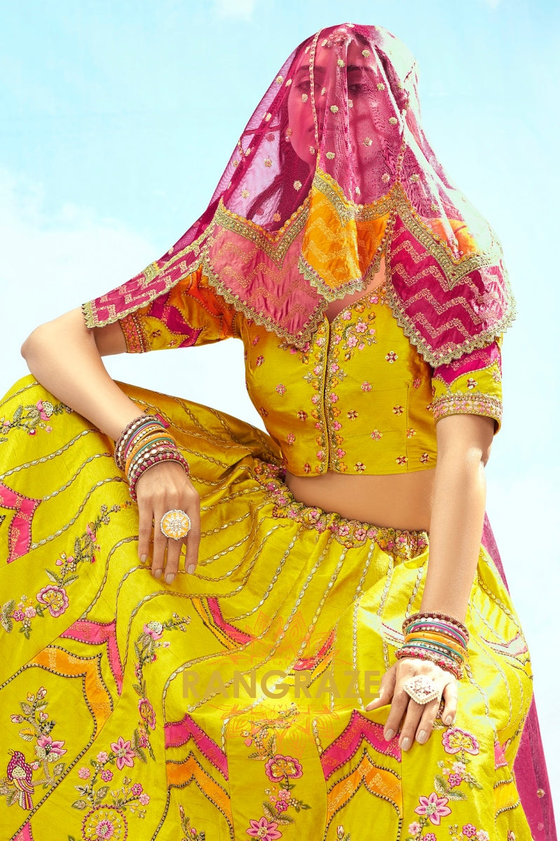 Radiant Yellow and Pink Embroidered Silk Lehenga Set