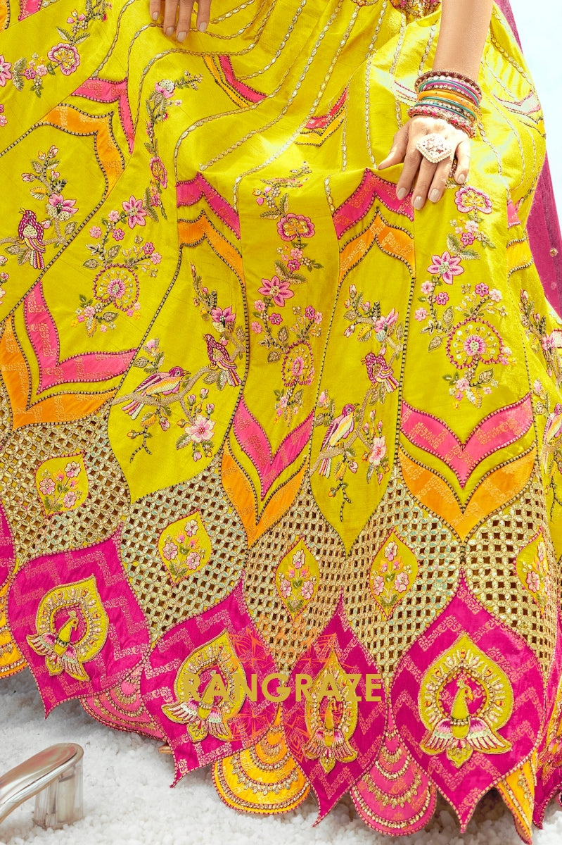 Radiant Yellow and Pink Embroidered Silk Lehenga Set