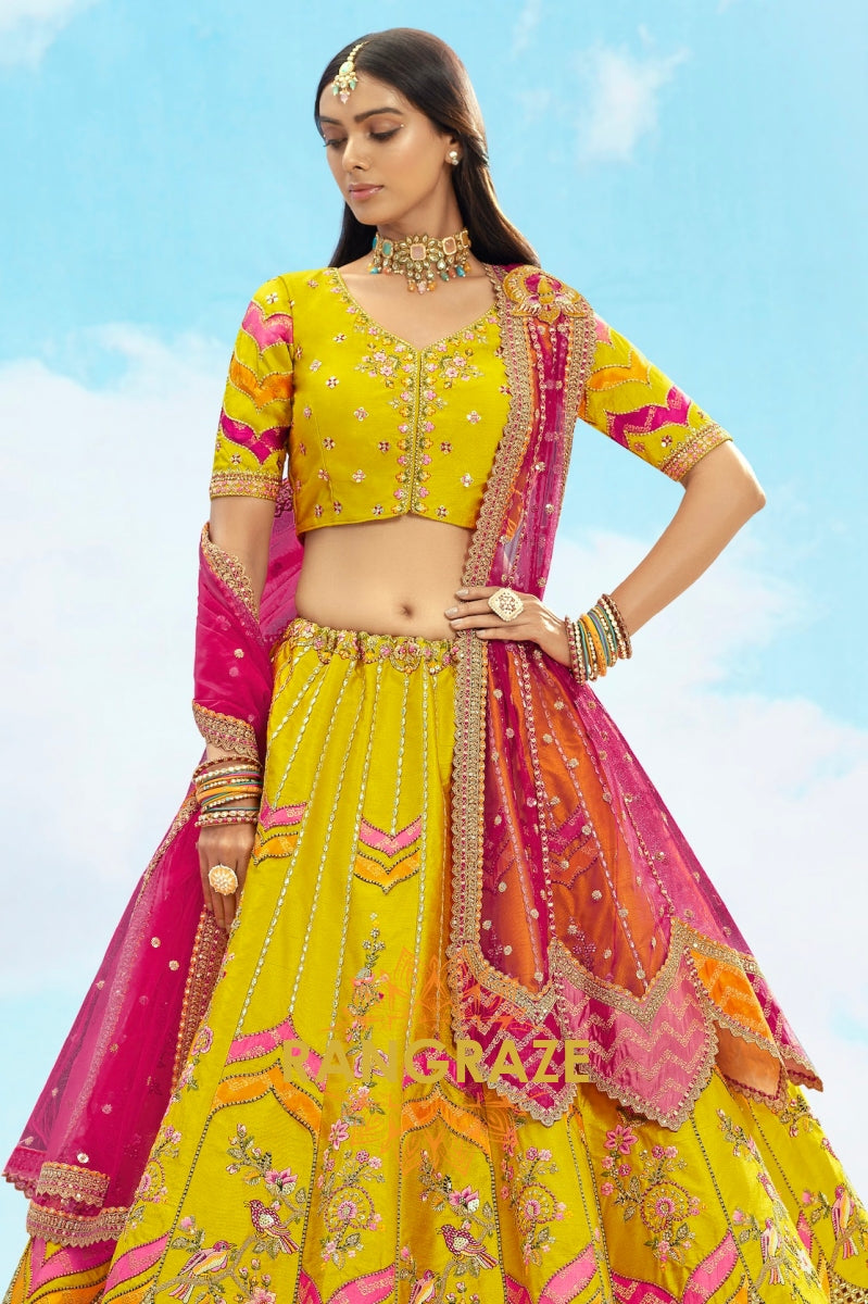 Radiant Yellow and Pink Embroidered Silk Lehenga Set