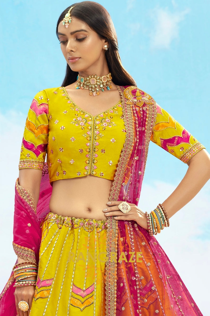 Radiant Yellow and Pink Embroidered Silk Lehenga Set