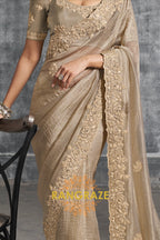 Golden Glow Charm: Embroidered Tissue Organza Saree
