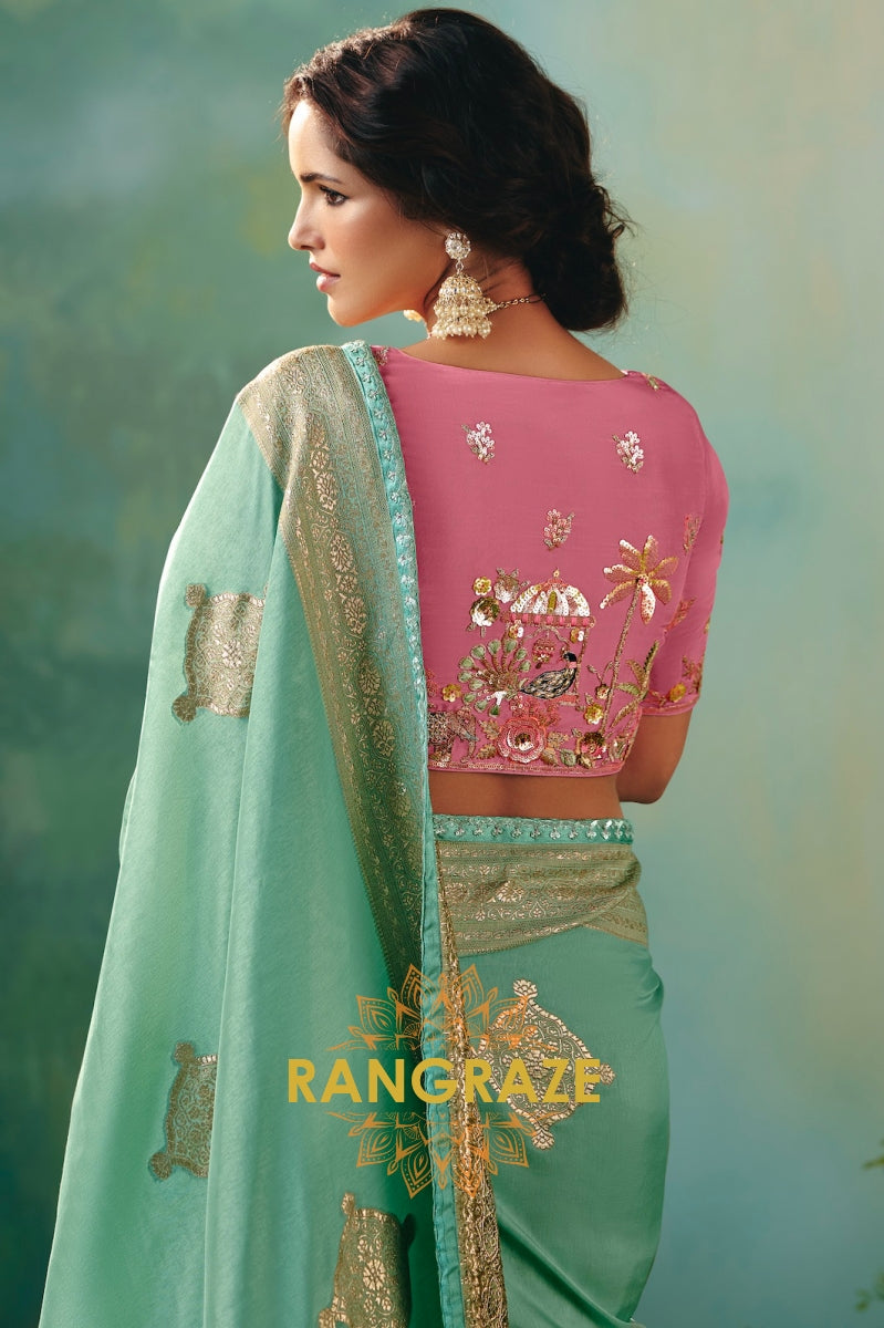 Mint Green Silk Saree with Zari Weaving and Pink Embroidered Blouse