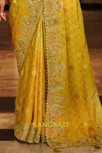 Golden Olive Charm: Designer Embroidered Tissue Silk Saree