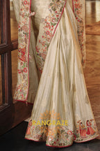 Royal Ivory Grace: Embroidered Silk Saree