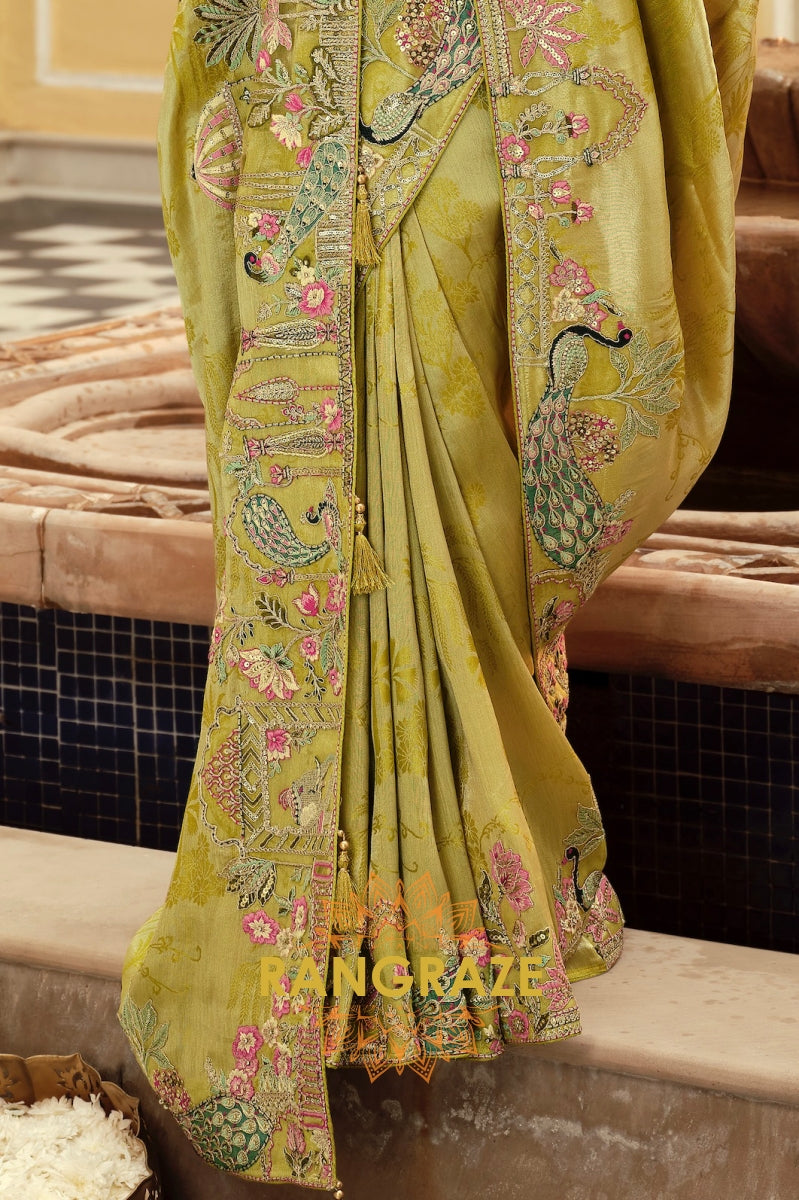 Enchanted Peacock Glow: Olive Green Embroidered Silk Saree