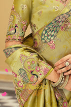 Enchanted Peacock Glow: Olive Green Embroidered Silk Saree