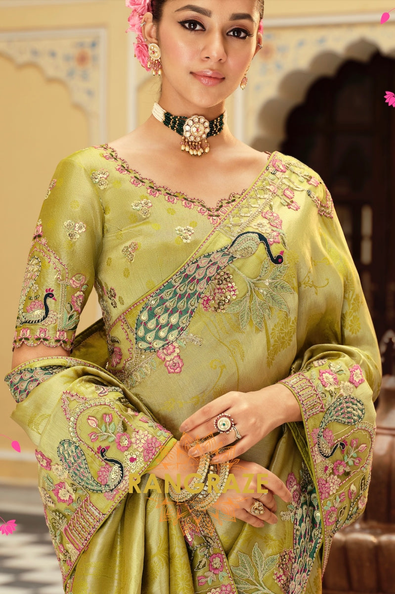 Enchanted Peacock Glow: Olive Green Embroidered Silk Saree