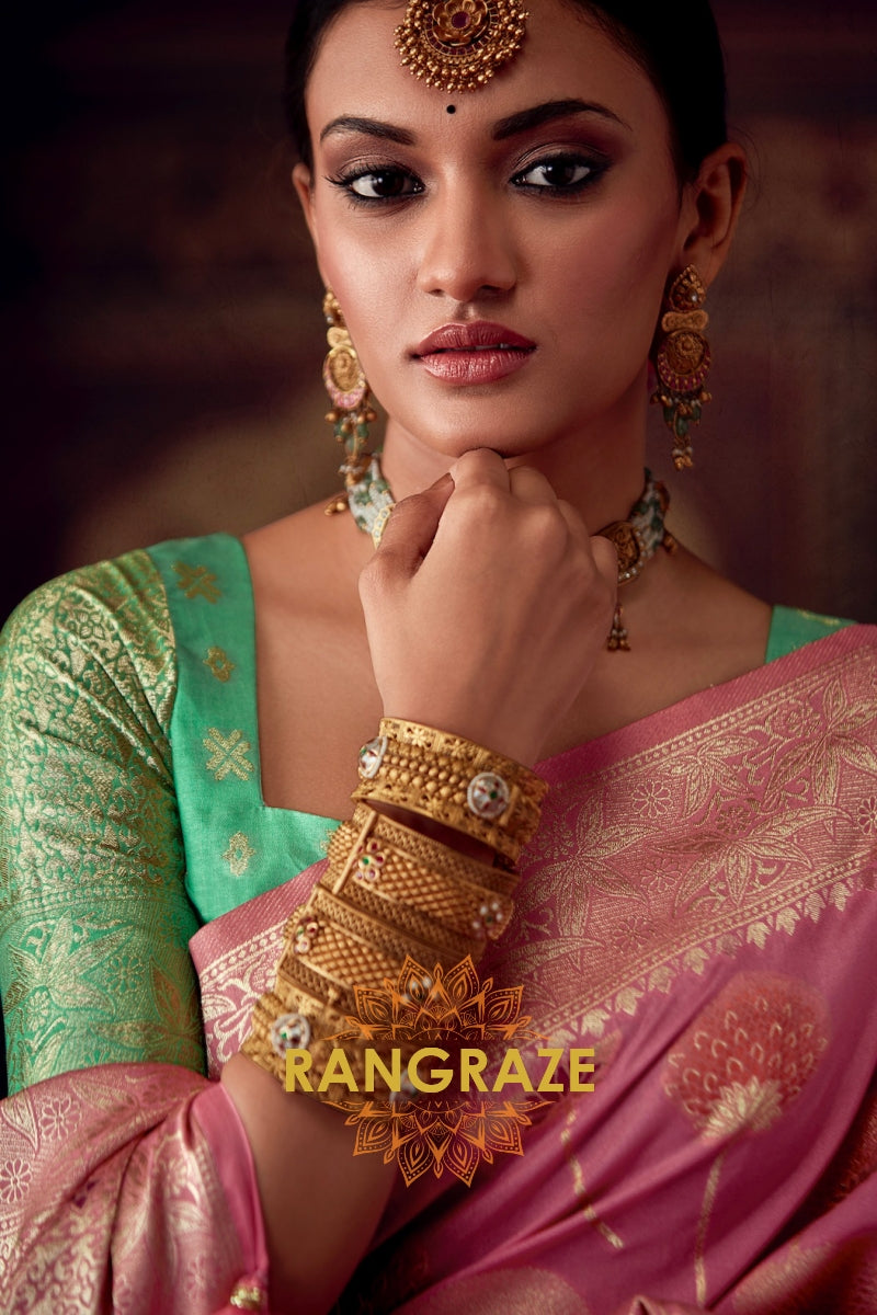 Flamingo Rose Radiance: Zari Woven Banarasi Silk Saree with Contrasting Emerald Green Blouse