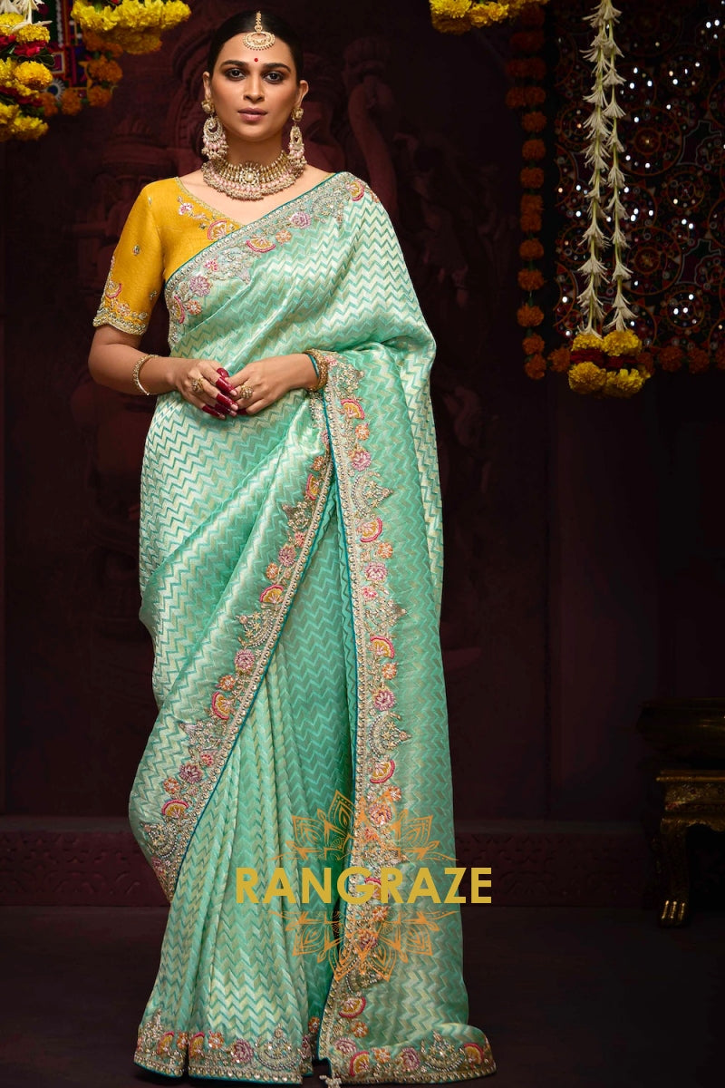 Golden Glow and Sea Green Banarasi Kanjivaram Saree – A Radiant Blend of Tradition and Opulence