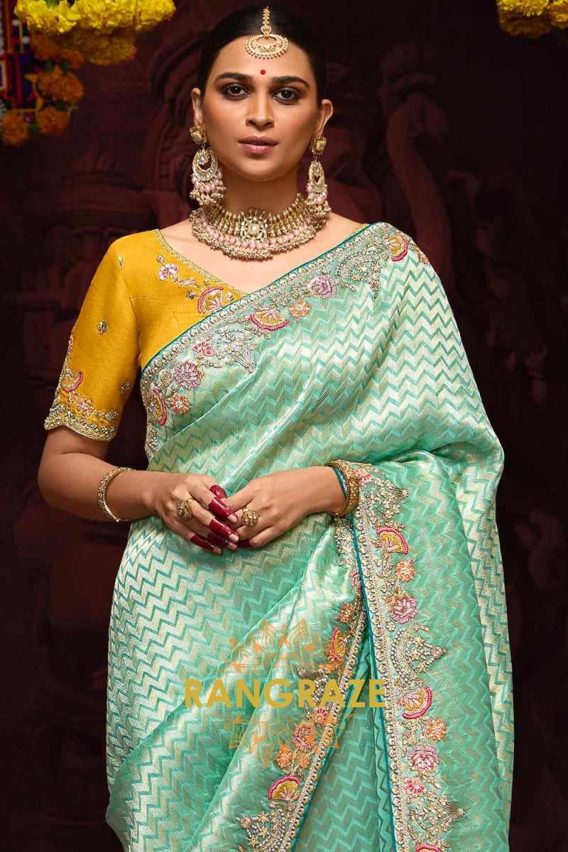 Golden Glow and Sea Green Banarasi Kanjivaram Saree – A Radiant Blend of Tradition and Opulence